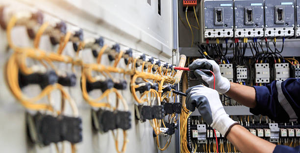 Professional Electrician technician working in Longview Heights, WA